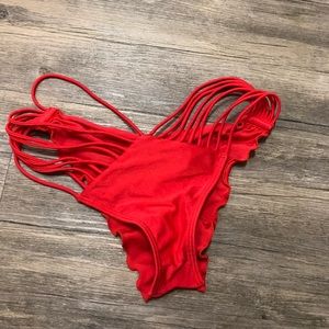 Luli Fama strappy bikini bottom